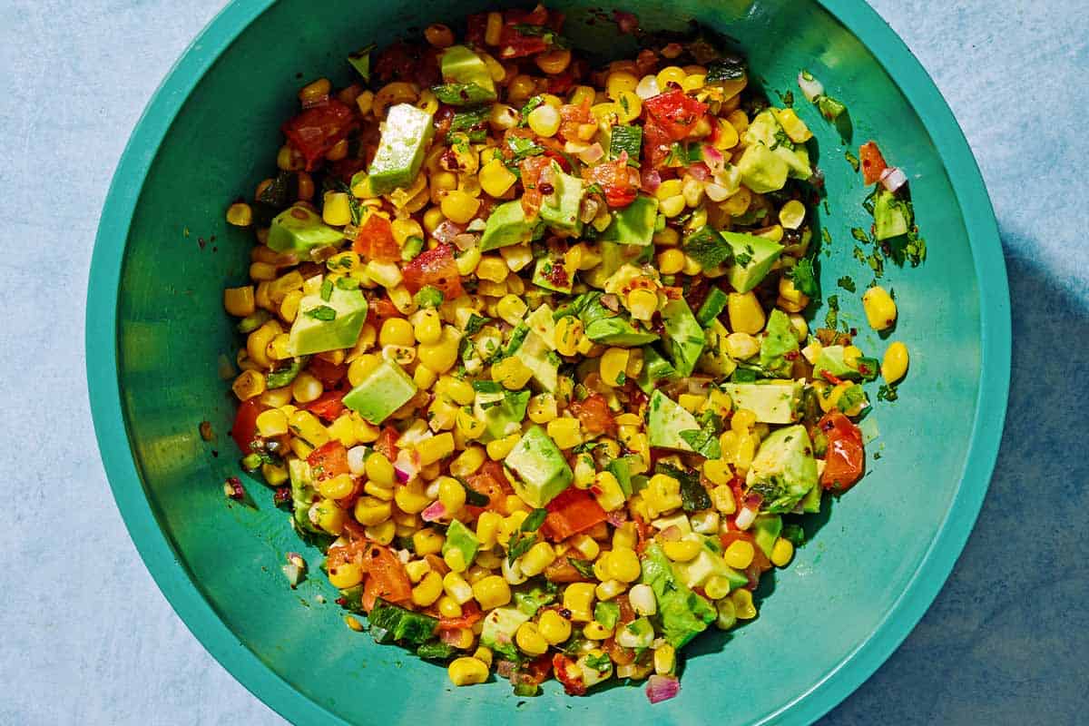 The sweet corn salsa in a mixing bowl.